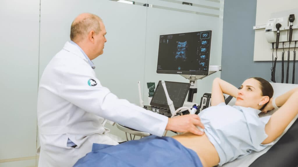 Dr Trippia performing ultrasound